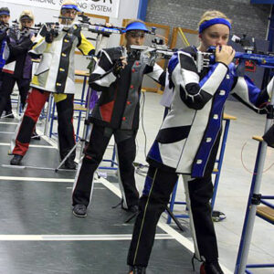 Emma Adams (front) lines up for the final in the junior women's air rifle at the Plzen Grand Prix in the Czech Republic.